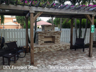 DIY Outdoor Fireplace under pergola