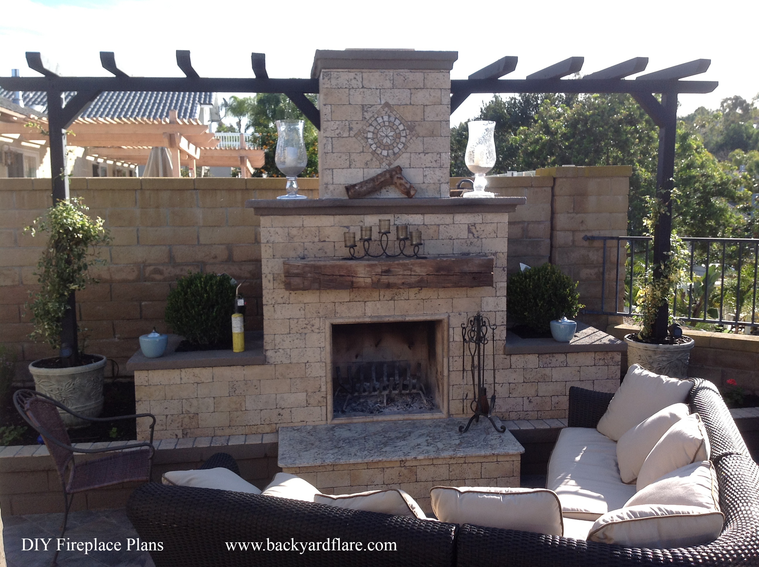 DIY Outdoor Fireplace under pergola